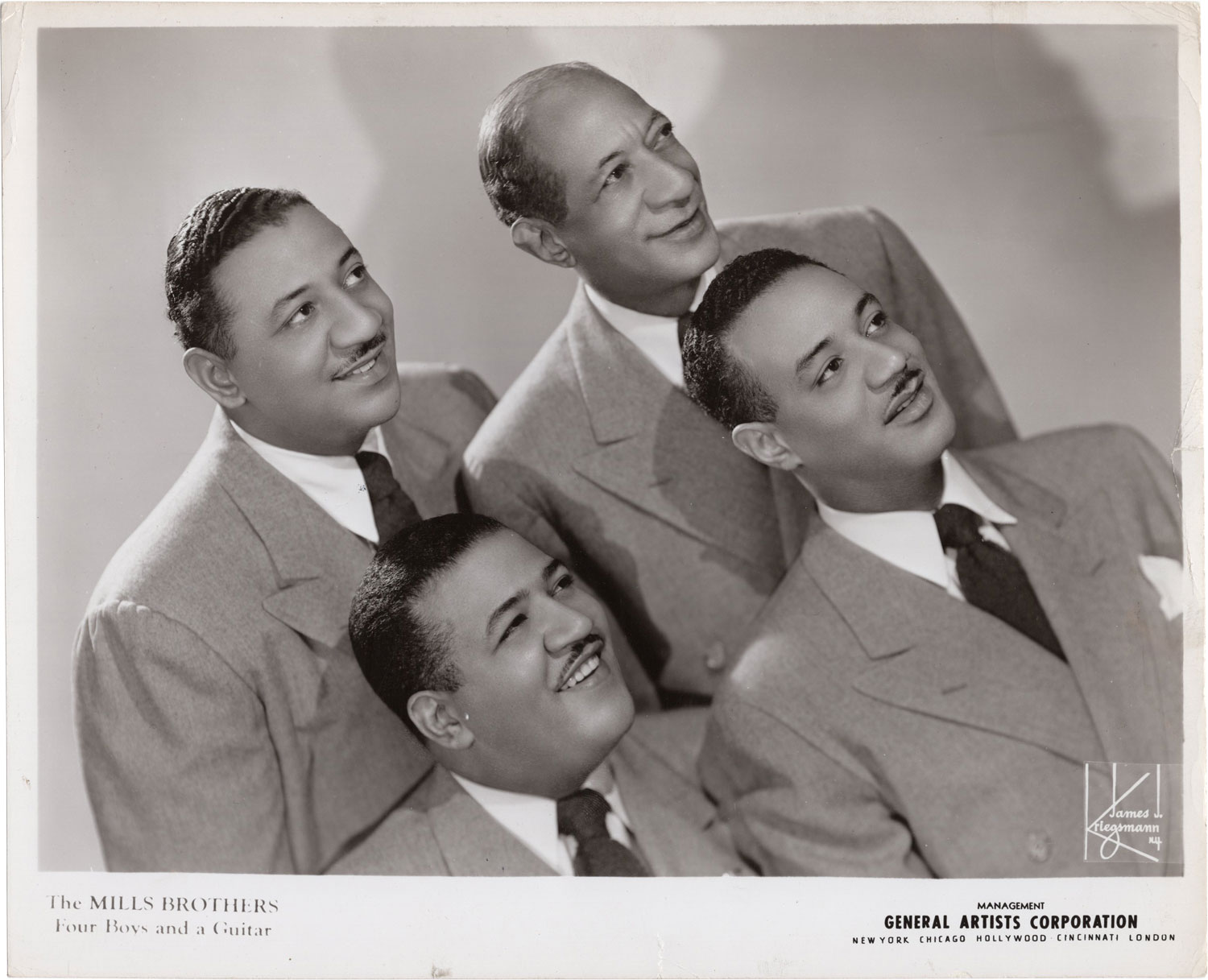 Collection of eight original photographs of The Mills Brothers The